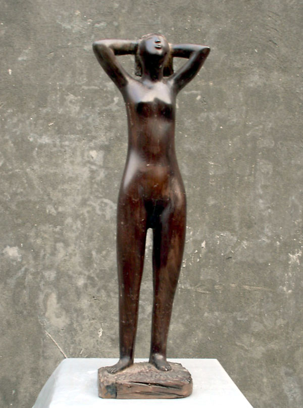 Woman Standing - a contemporry wood sculpture of a nude woman sculpture by Chinese sculptor Zhang Yaxi