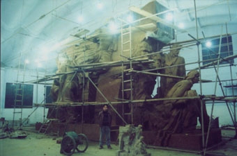 Monumental sculpture being worked on in sculpture studio
