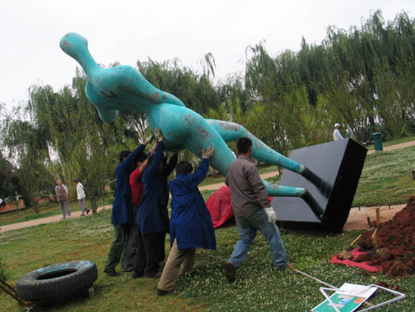 This monumental copper sculpture being transported to its final location in Daguan Park