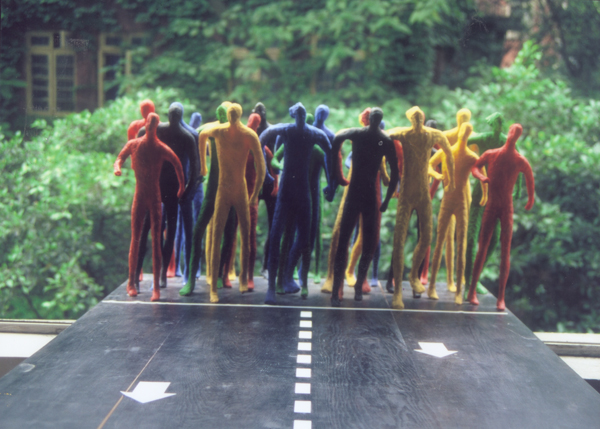 Runners - installation sculpture of running people by contemporary Chinese sculptor Zhang Yaxi