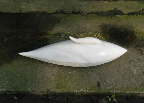Original sculpture in marble of a baby whale and mother whale - top view